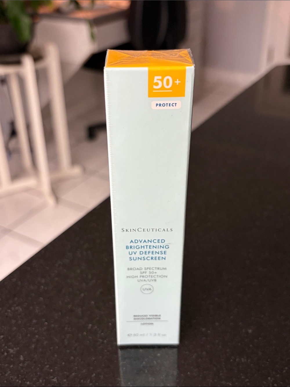 SkinCeuticals Advanced Brightening UV Defense Sunscreen SPF 50+ - White & Yellow